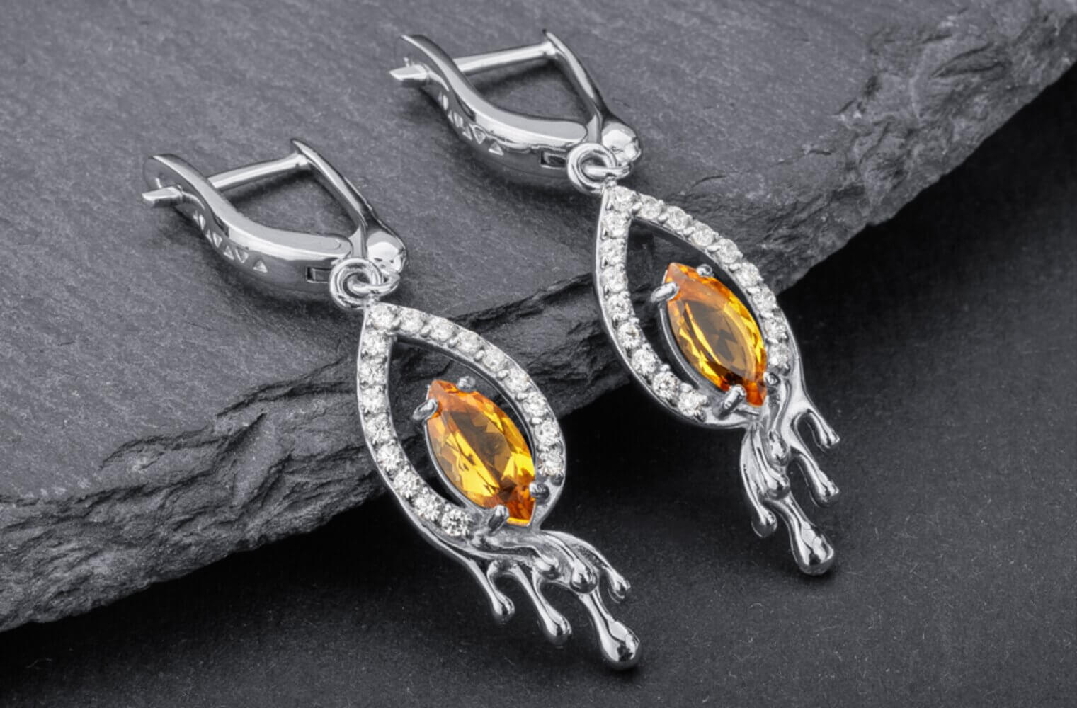 Silver citrine teardrop earrings with cubic zirconia halo and lever back closure