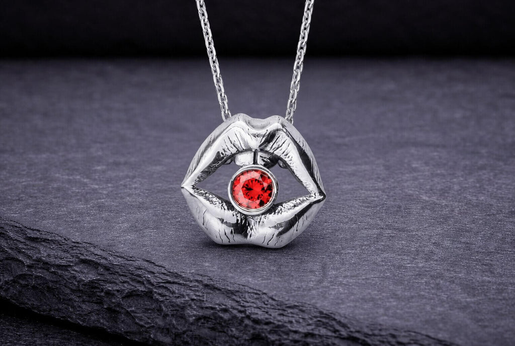 Sterling silver lips pendant necklace with red garnet gemstone