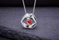 Sterling silver lips pendant necklace with red garnet gemstone