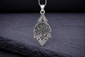 Sterling silver rose pendant necklace with diamond shaped frame and leaves