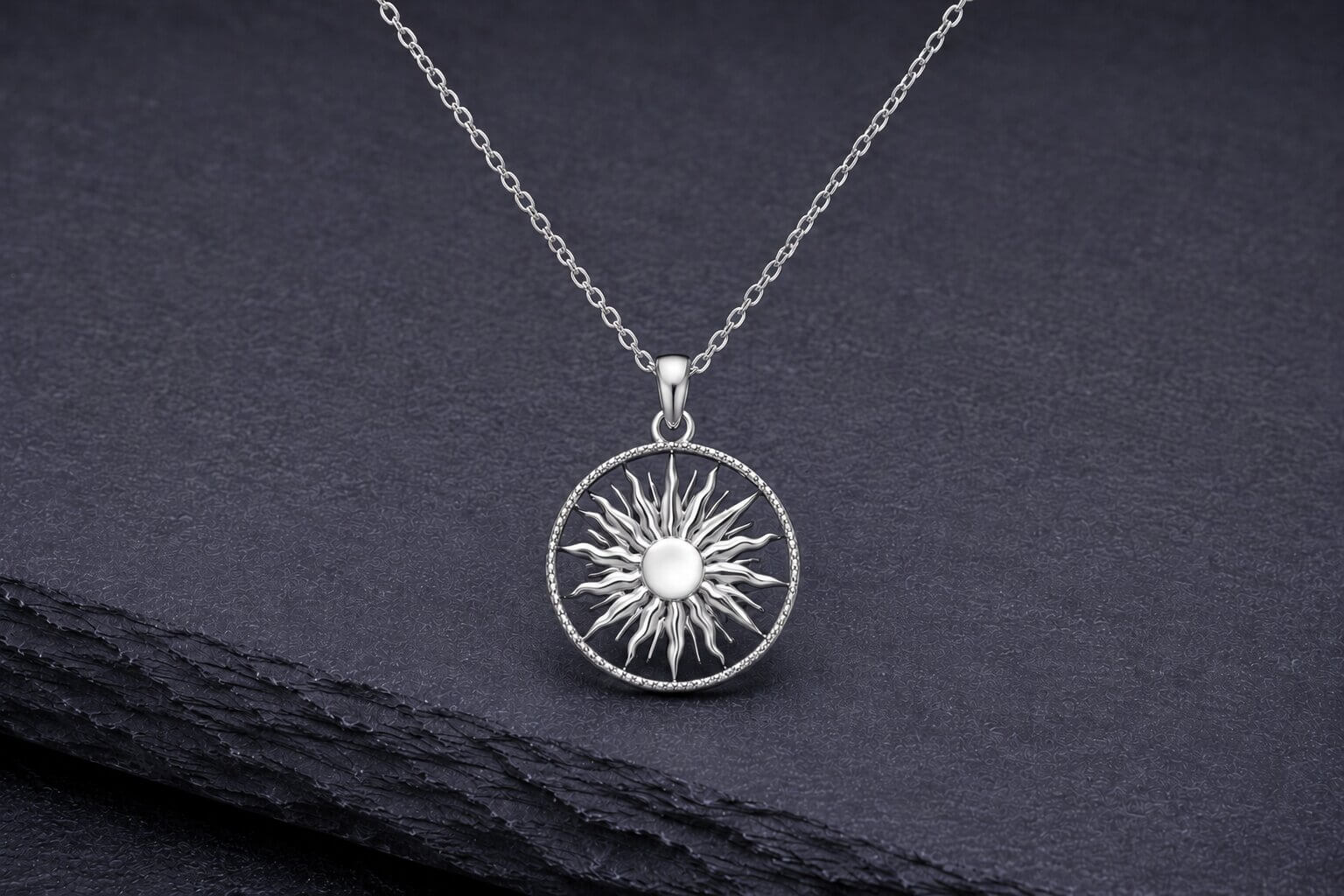 Sterling silver sun necklace with silver rays in circular frame