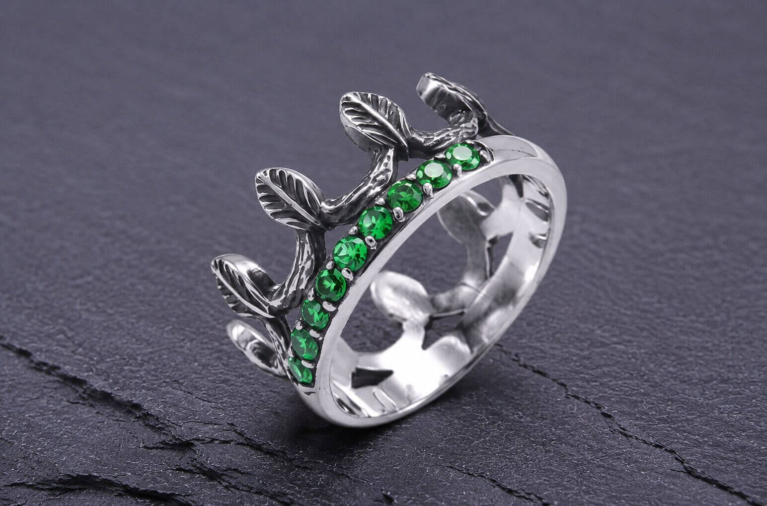 Sterling silver leaf crown ring with green cubic zirconia stones and oxidized detail